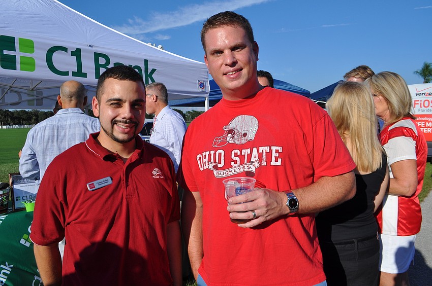 Carlos Colon and Ryan Harris enjoy the weather.
