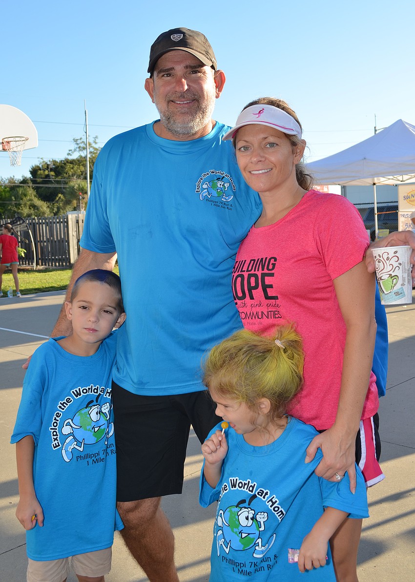 Tom and Christy Teffernhart attend the 7K with their children Reef and Polly.