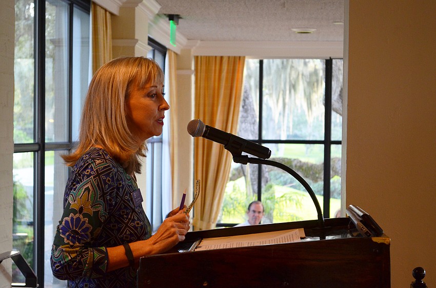 Olivia Thomas addresses the crowd at the Men of Courage breakfast.