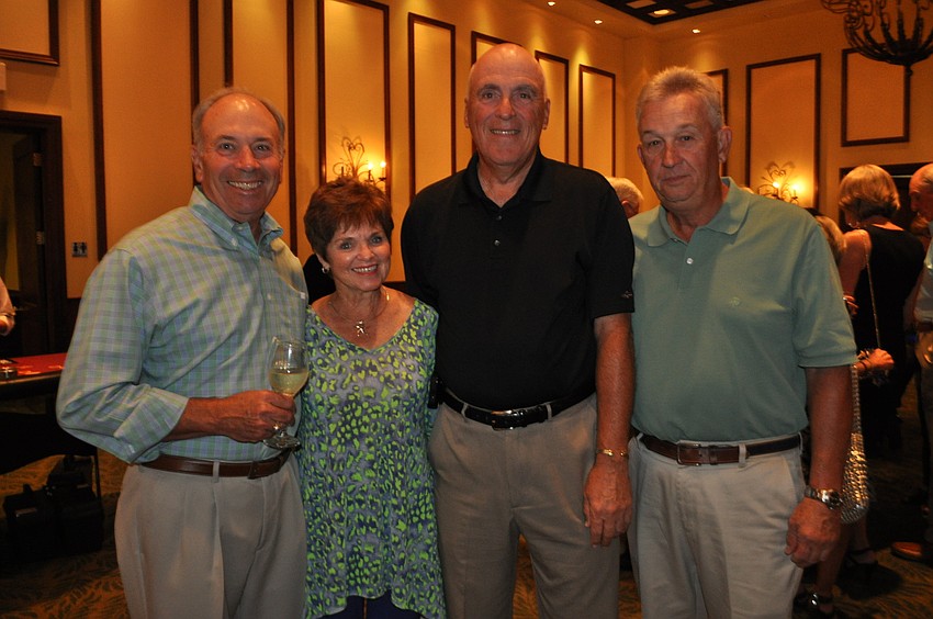 Vin and Ellen Buccellato join Jim and Joe Bousquet.
