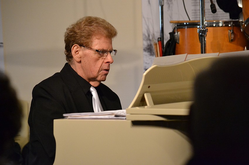 Billy Marcus plays the piano for the Al Hixon Jazz Group.