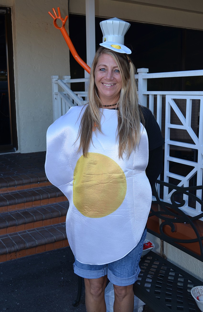 Sheila Medina of Another Broken Egg CafÃ© got in on the Halloween fun and dressed as an egg.