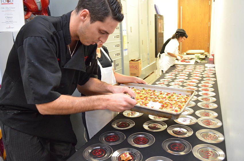 Clasico chef Guillaume Dupont prepares 500 plates for dessert.