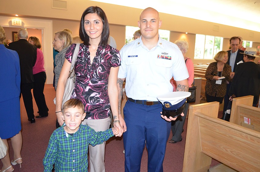 U.S. Coast Guard Officer Erik Pierantoni with his wife, Simona, and son, Nico, 4