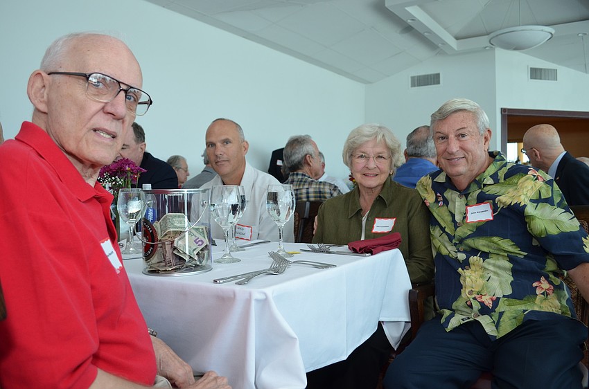 Jim Neuvirth sits with Gail and John Alexander.