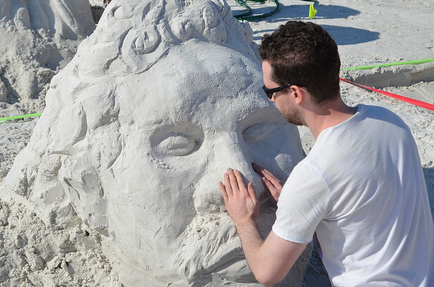 Brian Bohan works on a sculpture of Lionel Ritchie titled â€œLionelâ€ for the amateur competition.
