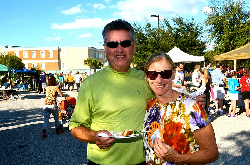 Phil and Elaine Lahm enjoy the grilled food.