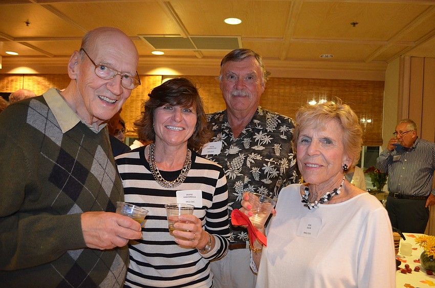 Jerry Regan, Diane Giacomelli, Hugh Farrington, president of the community association, and Sue Olin