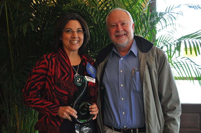 The Observer Media Group's Lori Ruth wins the 