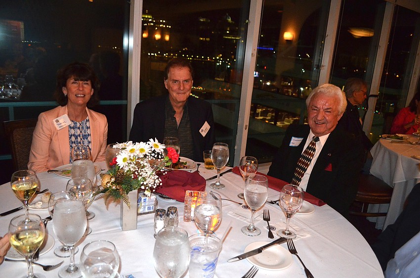 Debora and Jim Whitman with Tom Dzongowski