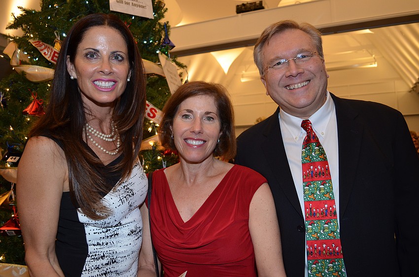 Sandra LaFlame with Mary Jo and Mike Gaio.