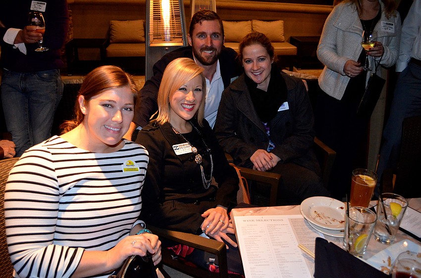 Lauren Blenker, Michelle Mohr Hange, Doug McDuffie and Amy Phillips enjoy time with friends.