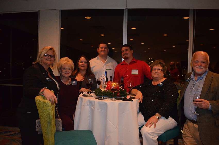 Pam Hagan, Patricia Benak, Jenn Flanders, Logan Waggoner, Michael Whiteside, Judy Smith and Rick Lamb, of Waterfront 7
