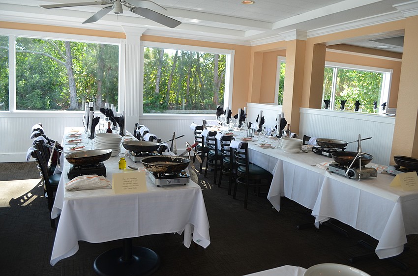 Attendees created three courses: spicy mint noodles with shrimp, lemongrass breast of chicken with kaffir lime and coconut green curry and mandarin bananas flambÃ©.