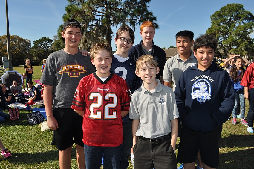 Clockwise from front center: John Proctor, Noah Cone, Alec Boot-Handford, Zane Shriver, Reece French, Matthew Nguyen and Sebastian Fria.
