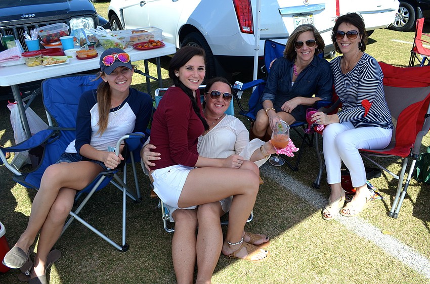 Lucy Milbourn, Tracy Alger, Shelby Lutinski, Peggy Milbourn and Darlyne Adamchak aren't polo regulars, but enjoy the match.