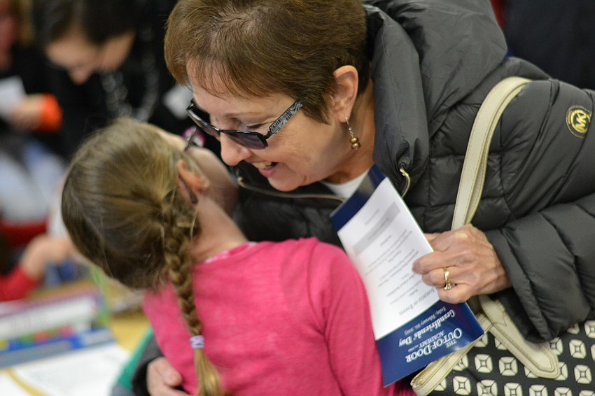Bobbi Miller greets her granddaughter Jessica Squitieri.
