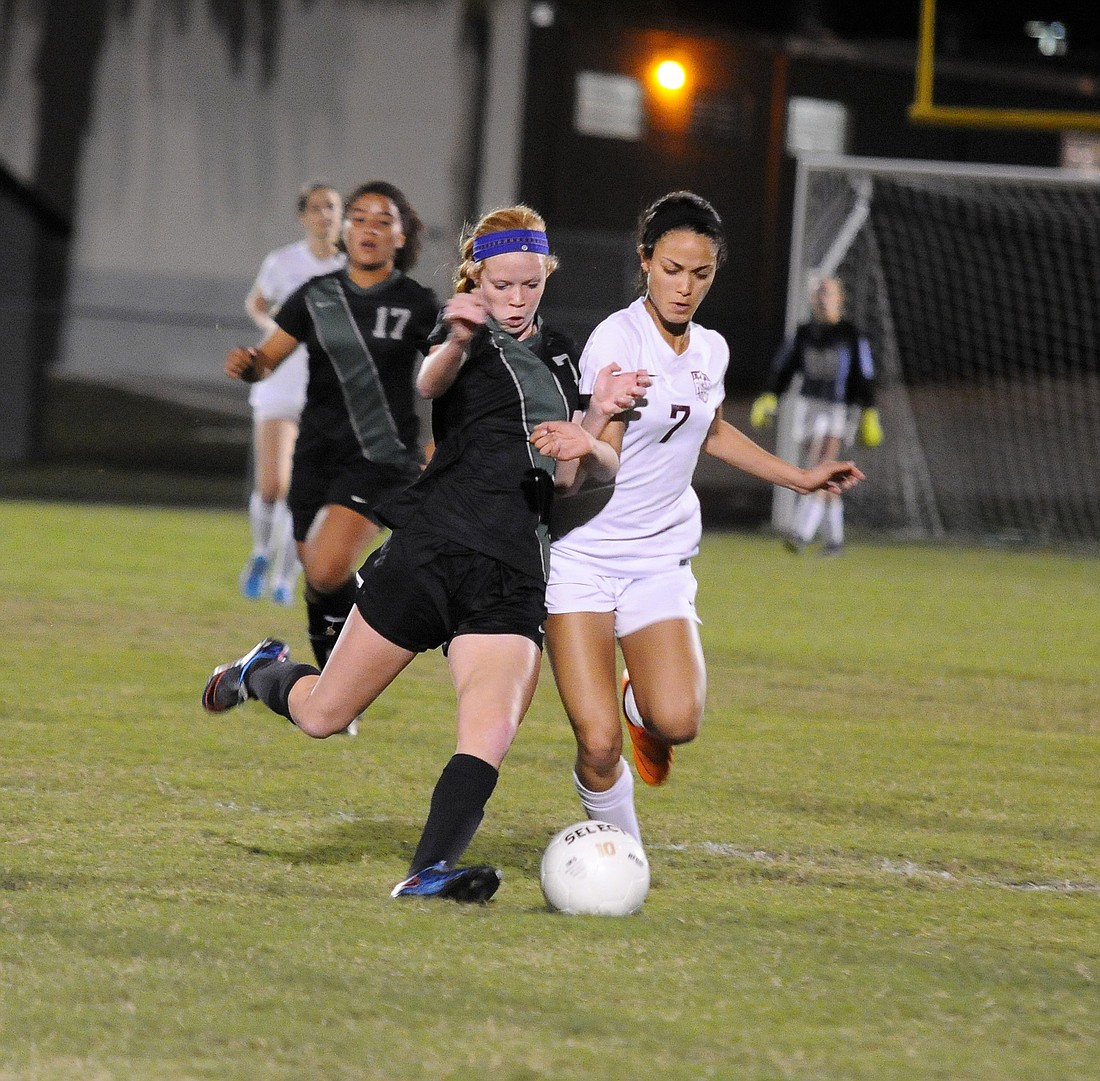 Lakewood Ranch's Caitlyn Klein battles Riverview's Gabrielle Levy during the Lady Mustangs' 1-0 victory Dec. 18.