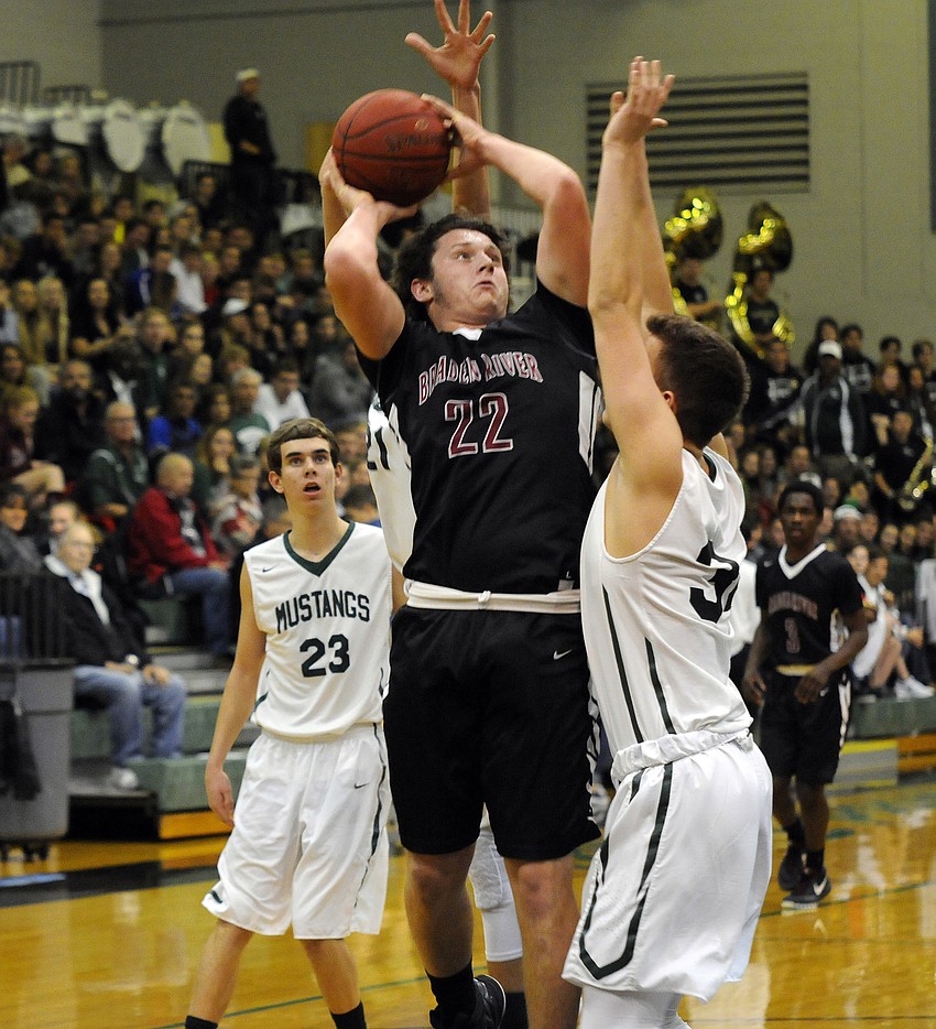 Braden River senior Tyler Dyson goes up for a shot in the first quarter.