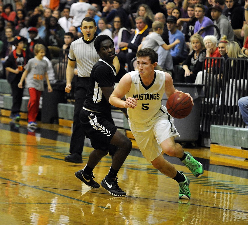 Lakewood Ranch's Sam Hester drives to the hoop.