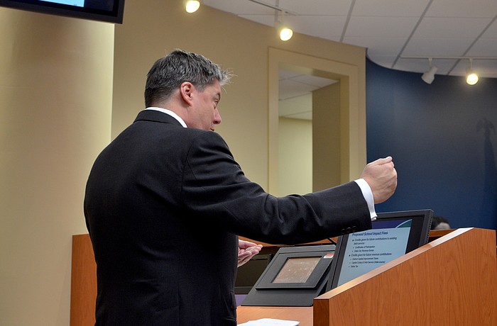 Carson Bise, of TischlerBise, explains how school impact fees are determined.