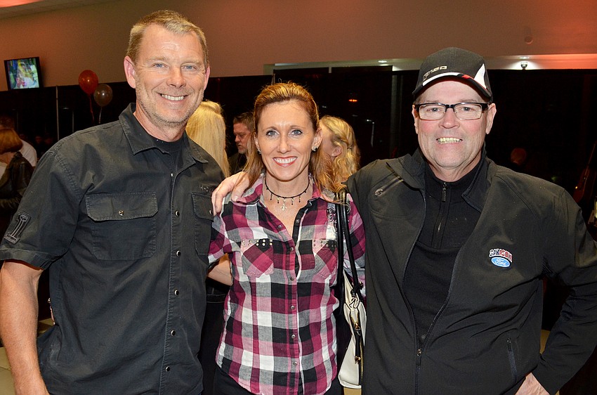 Allen and Katie Byczek with Matt Buchanan