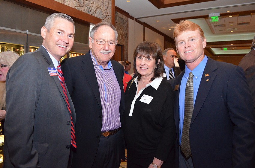 Ron Turner, John and Mary Metz and Sarasota County Commissioner Charles Hines.
