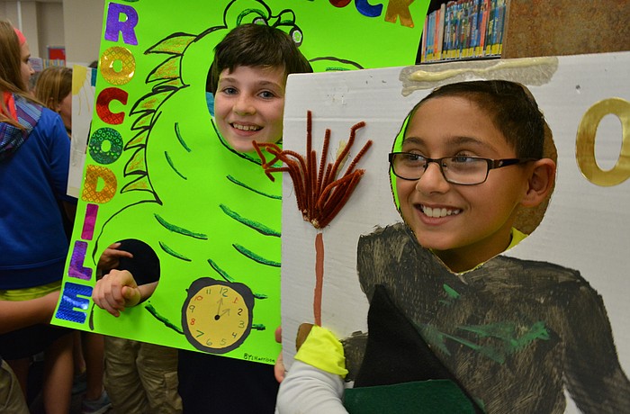 Harrison Troyan, behind, and Zaid Ibsais, front right, show off their characters, Tick Tock Crocodile and the Wicked Witch.