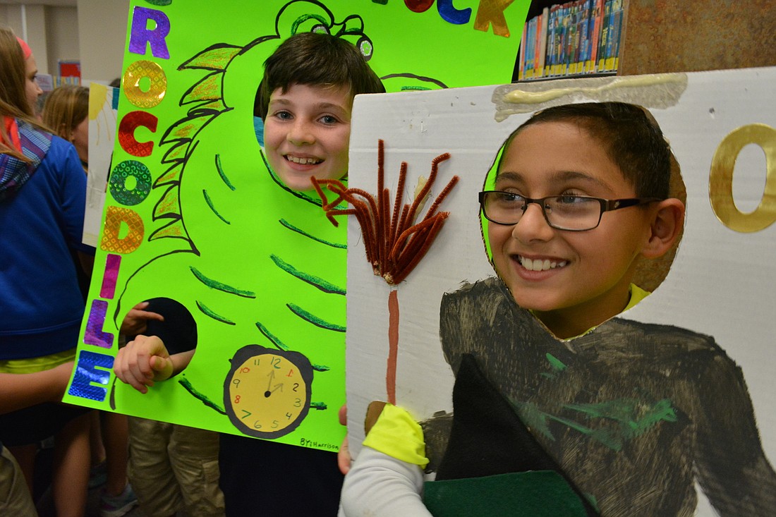 Harrison Troyan, behind, and Zaid Ibsais, front right, show off their characters, Tick Tock Crocodile and the Wicked Witch.