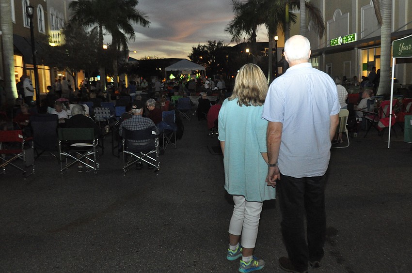 Mike and Denise Delich stop and listen to the Hatley Band. The Lakewood Ranch residents have been married for five years. 