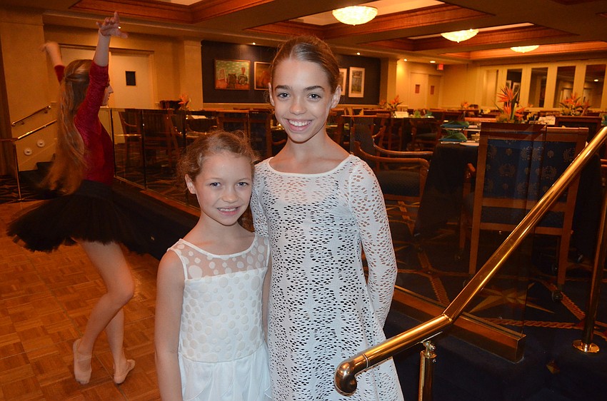 Isabella McKinney, 9, with sister, Virginia, 12