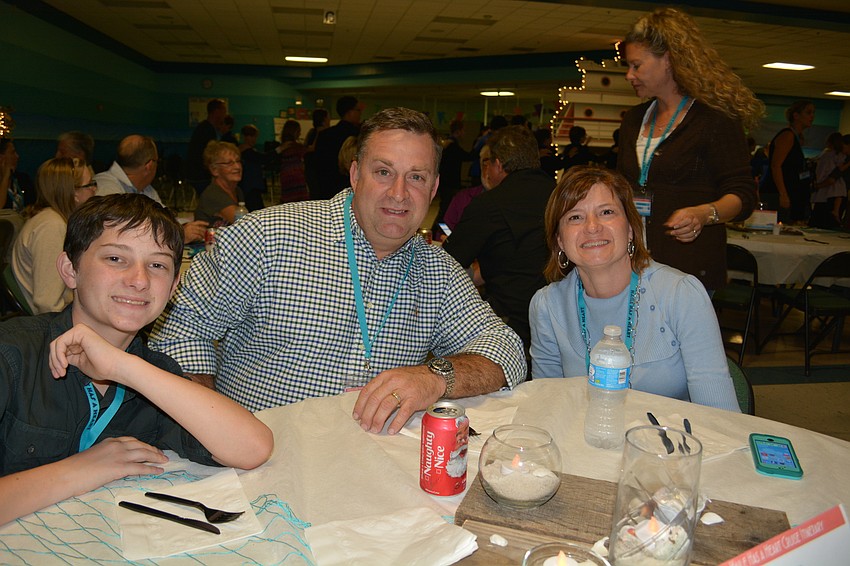 Austin Stiford attends with his friends, Bob and Susan Tyson.