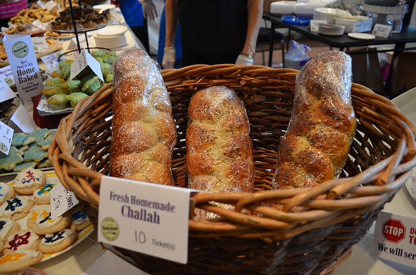 Challah breads on display and other baked goods were all made by Temple Sinai members.