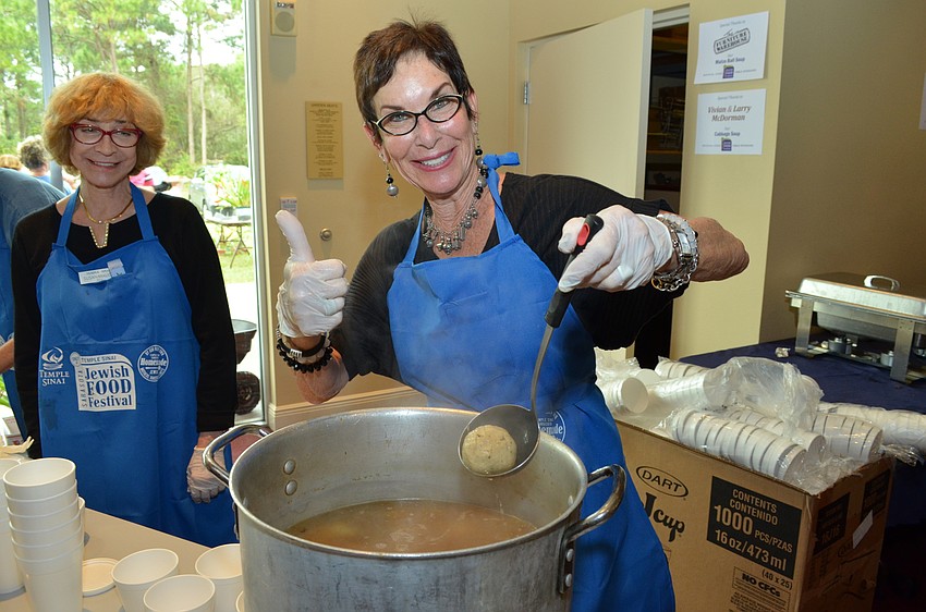 Janis Collier keeps the matzo ball soup hot for customers.