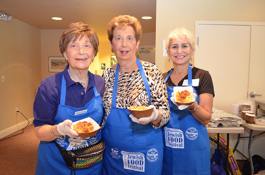 Myna Stoltz, Janet Moses and Shelly Markus with fruit kugel.