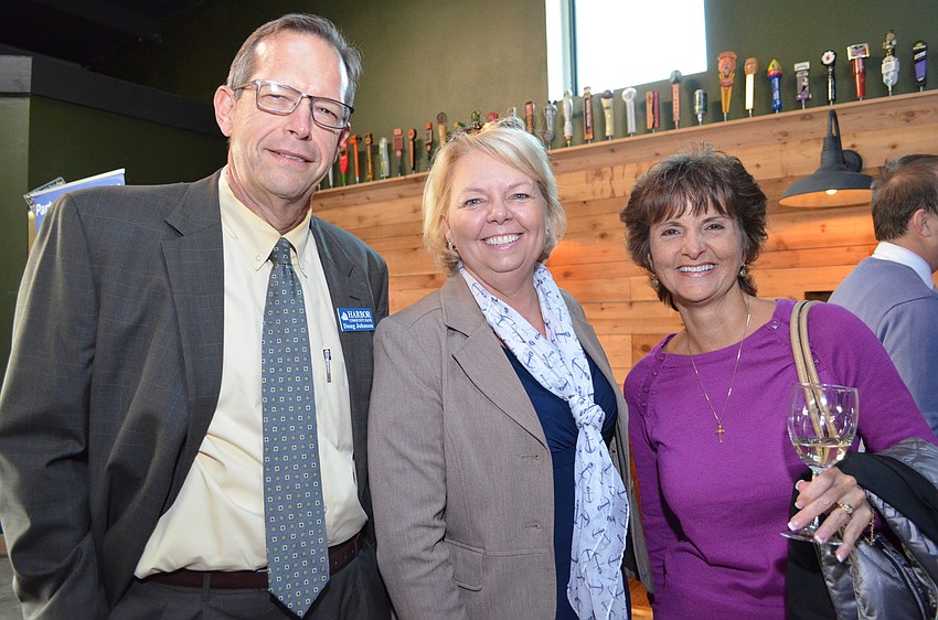 Doug Johnson, Harbor Community Bank with Tish Murphy and Anna Bliss of Insignia Bank.