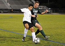 Lakewood Ranchs sophomore forward Pablo Vargas battles Venice's Christian Kuffer for the ball.