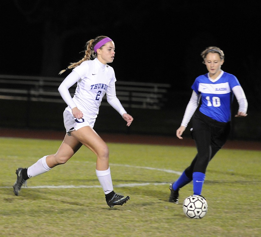 ODA's Madisyn Opstal attempts to maneuver the ball past Sarasota Christian's Emma Kral.