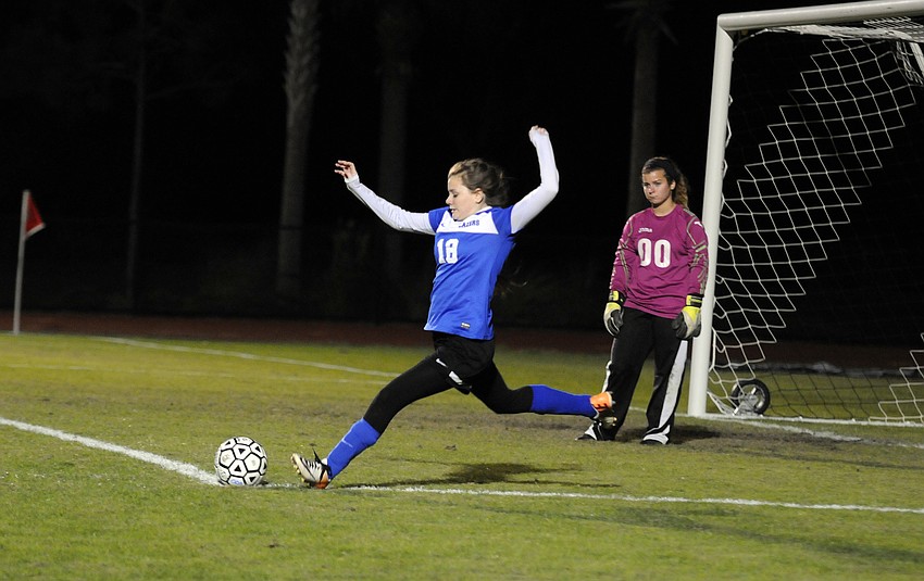Sarasota Christian's Lainey Helmuth takes a goal kick in the first half.