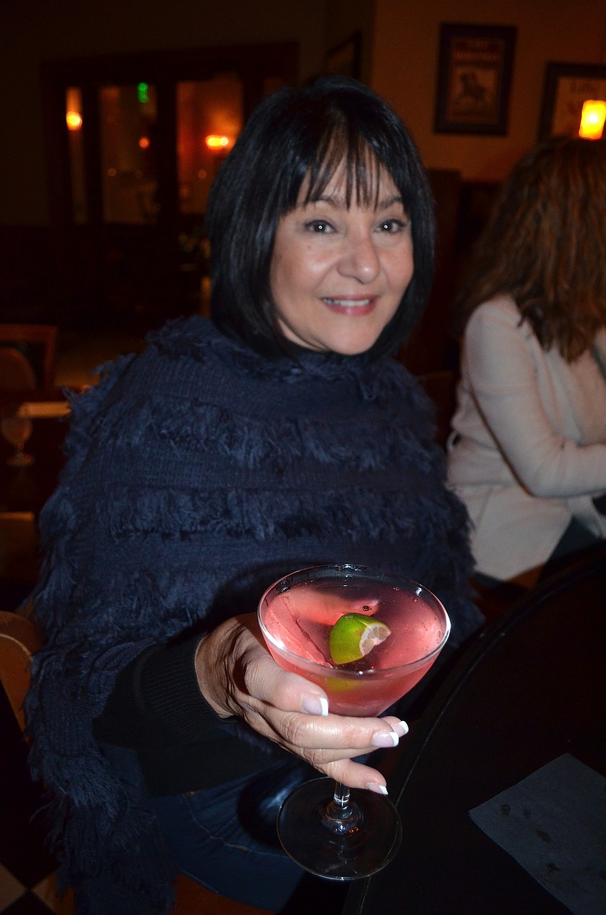 Cathy Carrubba toasts to a fun night.