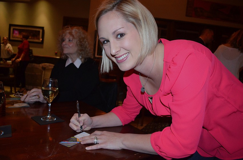 Lindsay Scheuer applies for a chance to win a cruise.