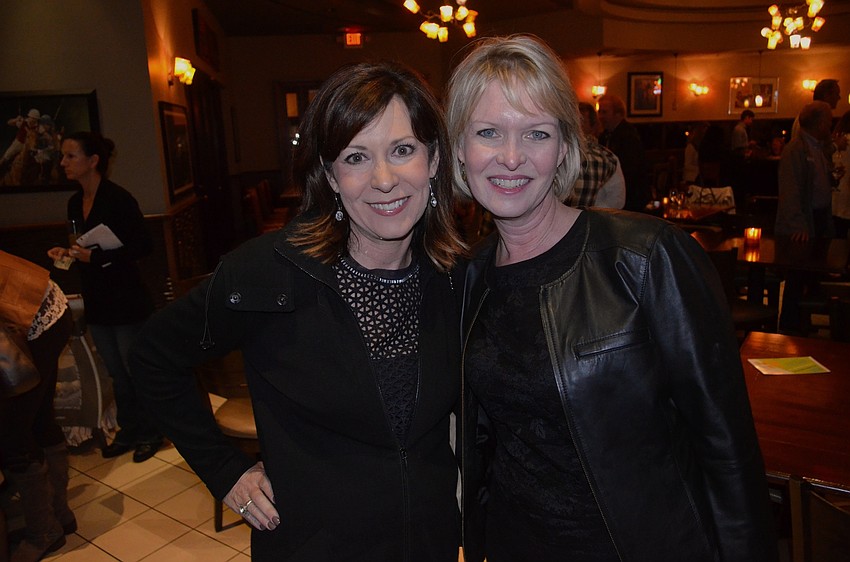 Michelle Senglaub and Veronica Brady show off their black dresses.