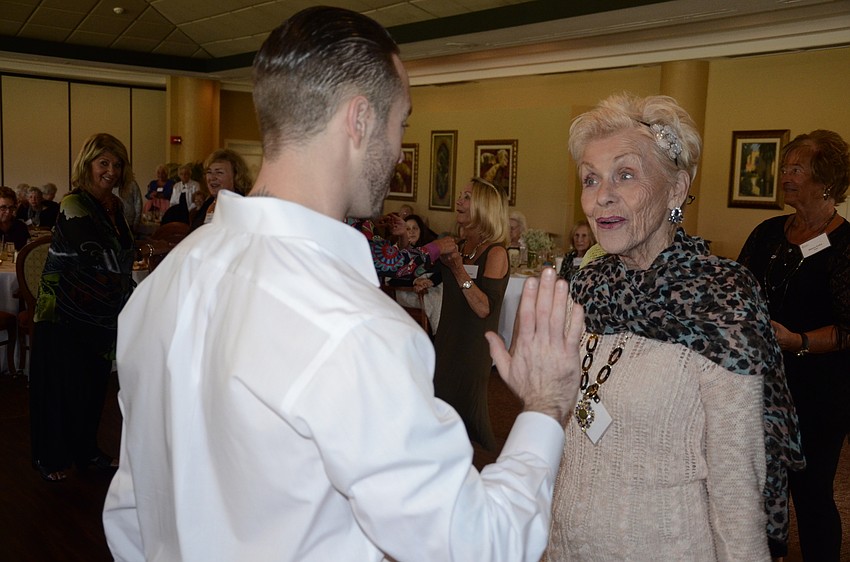 Charles Cunningham practices salsa with Pat Cerrato.