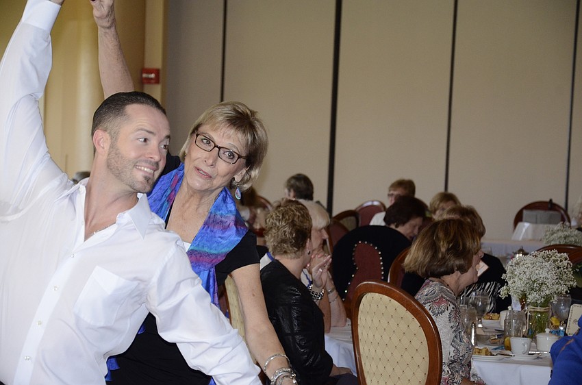 Charles Cunningham dances with Peggy Fainelli.