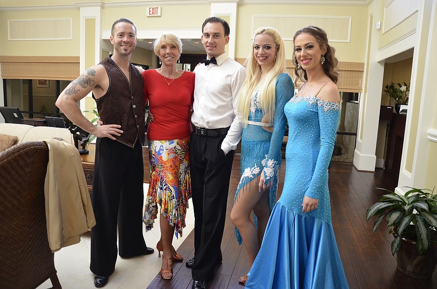 Dynasty Dance Club dancers Charles Cunningham, Maksym Lototskuu, Sarah Haworth and Angie Fundo with Palm Aire Women's Club member Dolores Jacksland