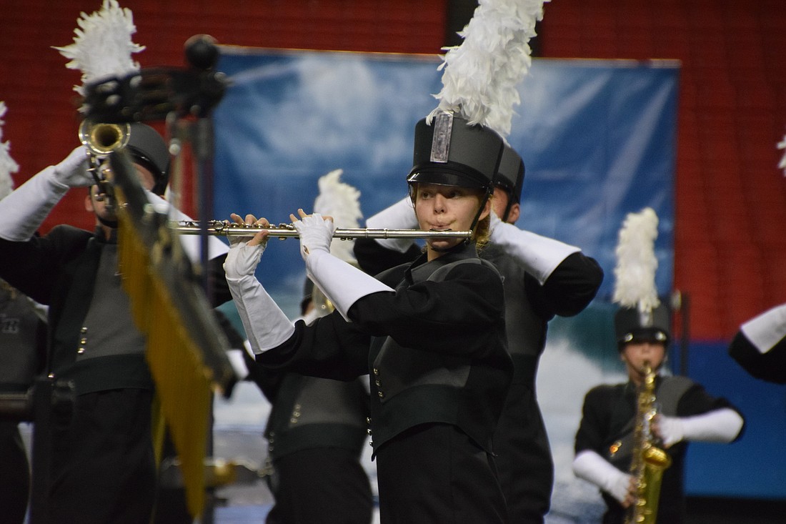 (CONTRIBUTED) Caroline Odell playing flute for the marching band in Peach Bowl competition.