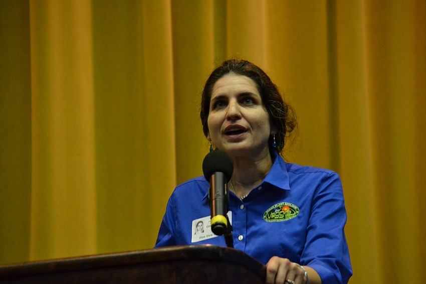 Lead Veggie Scientist at NASA Gioia Massa explains to students the progress being made to grow edible plants in space.