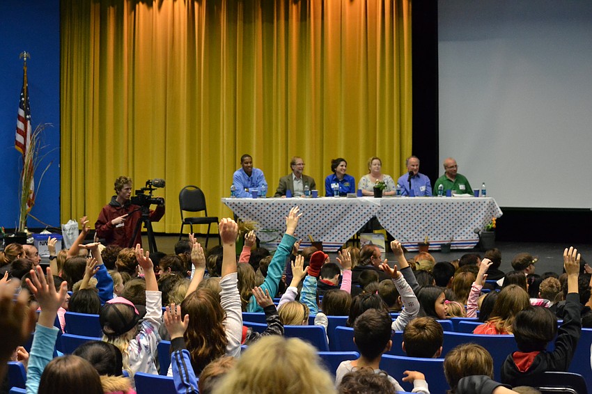 Students raise their hands during the panel discussion at Pine View School Friday, Jan. 15.