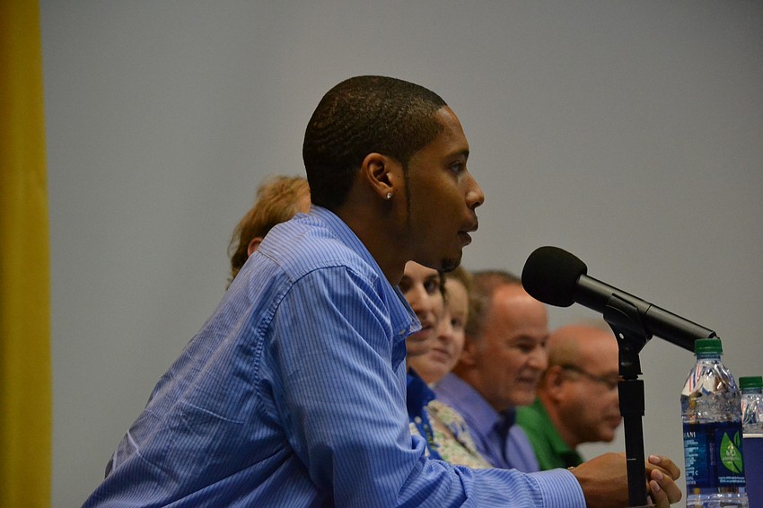 Matthew Mickens a NASA postdoctoral fellow fields a question from Pine View School students.