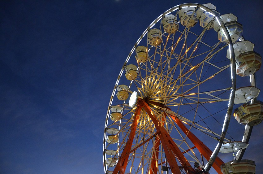 The Belle City Midway ferris wheel lit up the sky at the fair.
